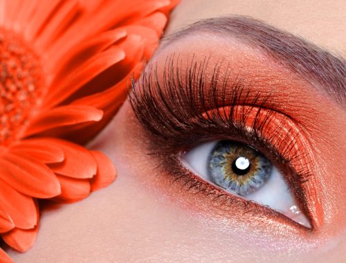 false-eyelashes-and-fashion-eye-make-up-with-orange-flower